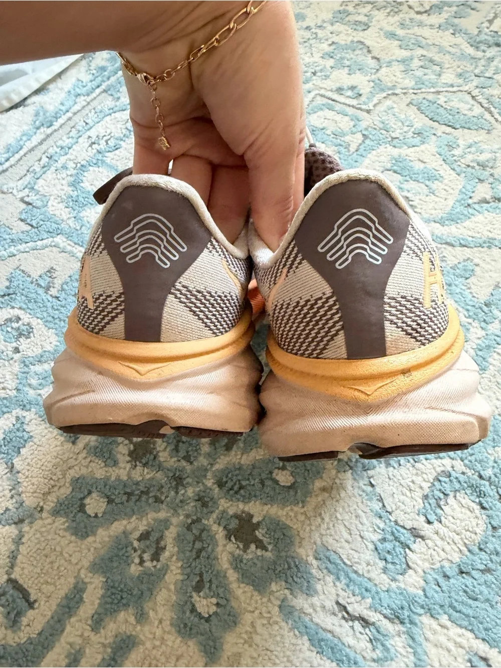 Hoka Women's Clifton Running Shoes in Brown and Orange